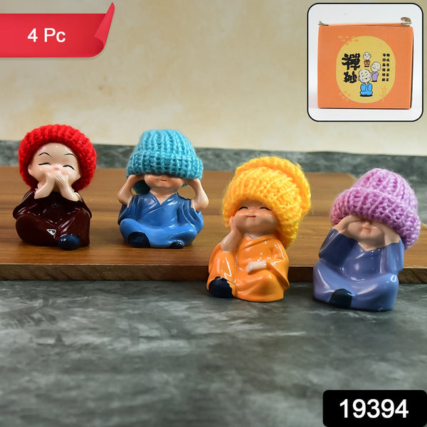 Decorative Resin Monk Buddha Showpiece Set of 4 with Traditional Straw Hats